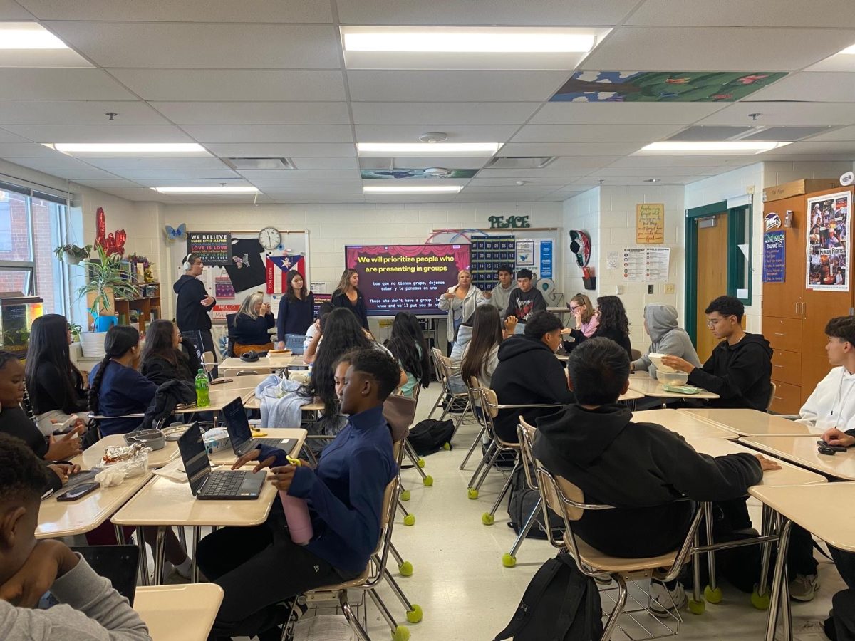 Students gather in classroom 122 to discuss their plans for the upcoming Hispanic Assembly. The conversations are about the dances, the order of performances, and what the speeches will be when the assembly occurs on Nov. 21. (Courtesy Vera Jiminez Perez)