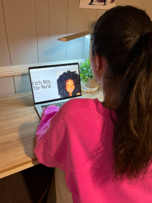 Senior Elisa Deparis writes her own blog on curly hair. Deparis started her blog last spring because she wanted to share advice on how to take care of curly hair. Her goal is to help people on their curly hair journey, and to make them feel more confident in their hair. (Courtesy Elisa Deparis)