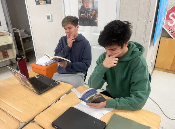 In AP Literature and Composition, students are reading "Tess of the D’Urbervilles", by Thomas Hardy. A table group of seniors analyzes and discusses a chapter from the book, sharing their opinions.