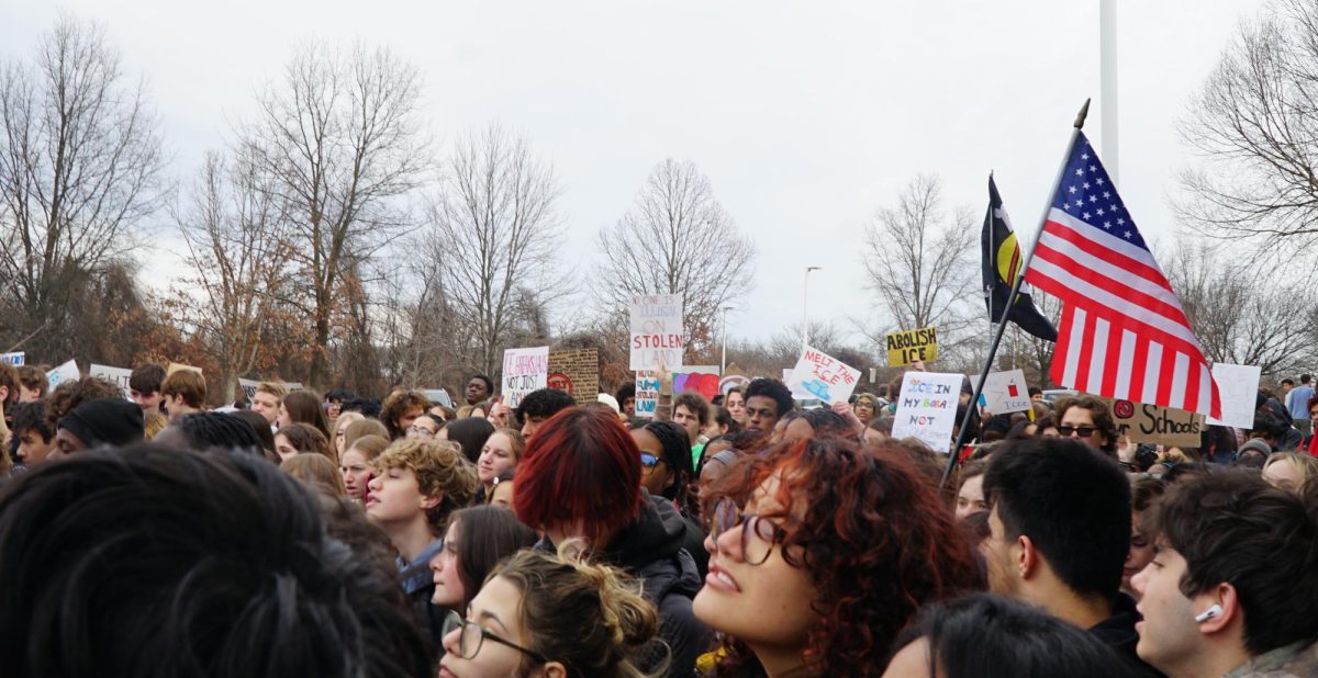 Hundreds of WJ students gather in the bus loop during the anti-ICE walkout. The walkout was held to show solidarity with people affect by immigration policies and ICE raids.
