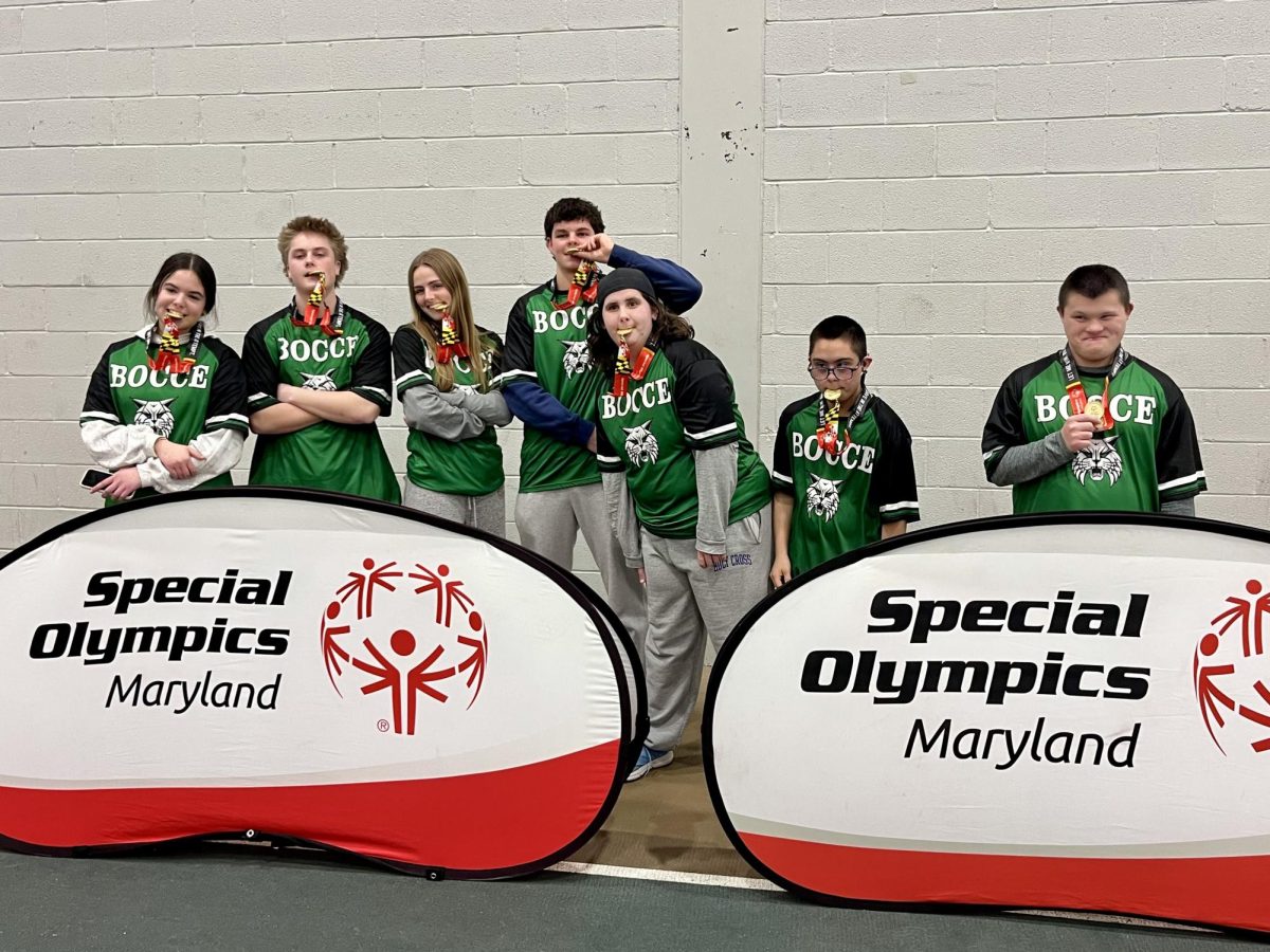 The Bocce team poses for a picture with their gold medals in hand. The team's season ended in success following their 8-3 handling of Dulaney in the finals. (Courtesy Martha Nguyen)