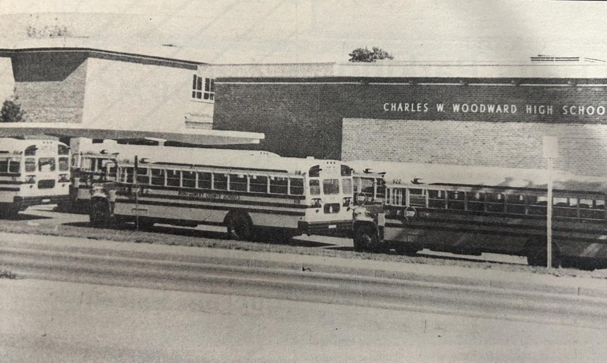 Busses depart from the old Charles Woodward High School during dismissal time in 1987. After the building was used as a holding school for a few years, Woodward High School eventually became home for Tilden Middle School until 2020, when the building was demolished and has since been rebuilt. (Courtesy The Pitch 1987-88)