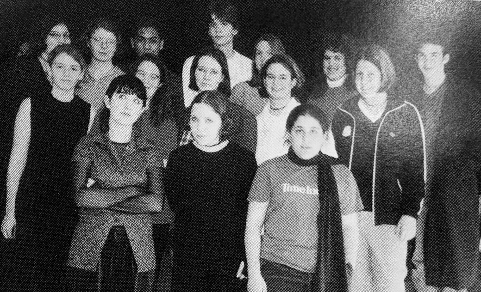 Members of Outlook Club, including Emily Button '98, pose for their yearbook photo in 1997. (Courtesy The Windup)