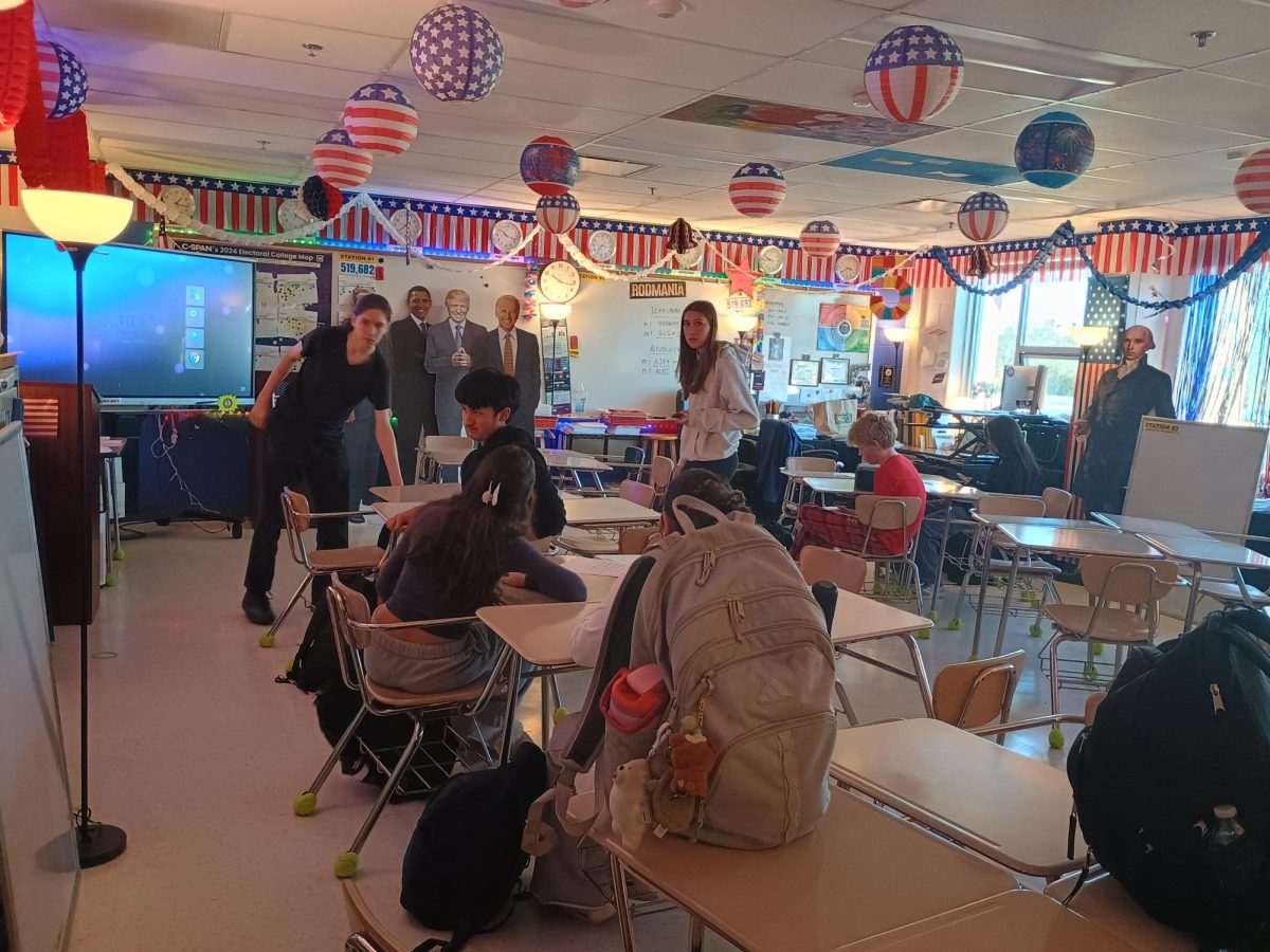 Students are preparing for their AP Government class in Mr. Rodman's room 108. In class, they discuss political events, including the necessary course content in preparation for the AP exam on May 5th.