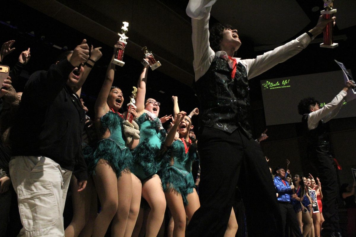 Passion Latino celebrates together after winning multiple first-place awards in cha-cha, merengue, bachata, salsa, Jack and Jill and best in group. “Bringing all six first-place trophies was not in our books. We were all really shocked, but I feel like we would at least place in each category. Bringing the first was just really shocking for us,” captain, senior Tatianna Cabrera said.