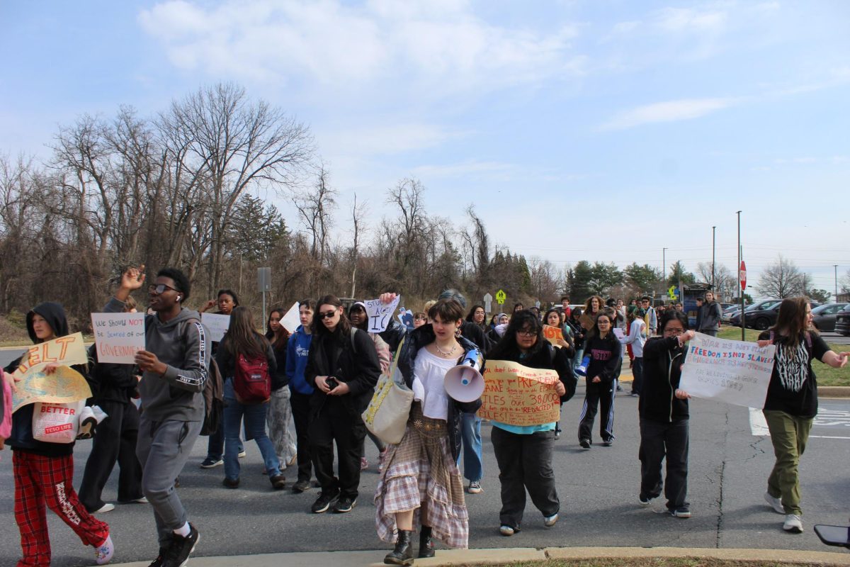 A group of Northwood High School students join with several demonstrators from WJ in a protest against ICE. The Northwood students marched over a mile to and from their campus for the protest.