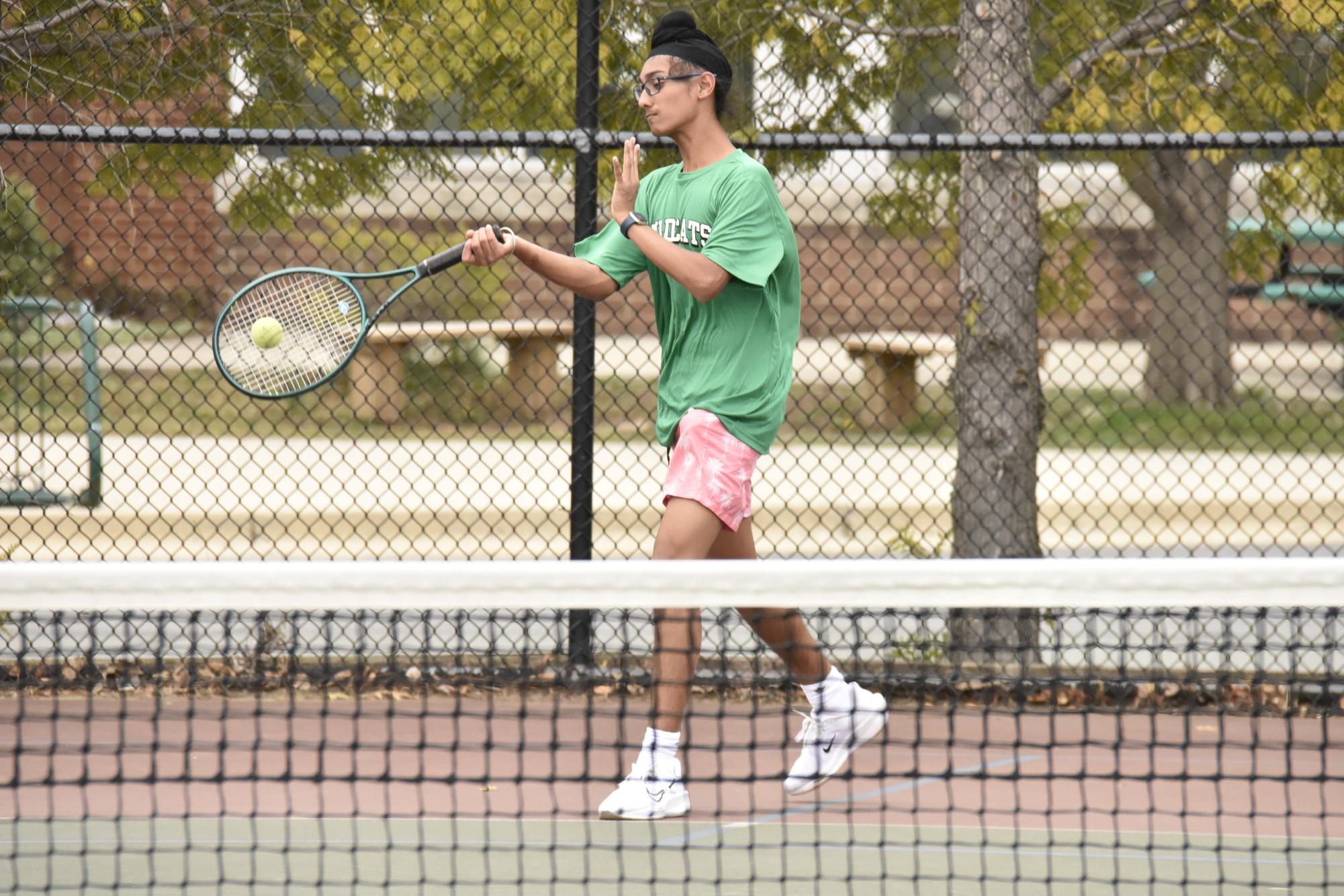 Sophomore Veer Anand drives the ball down the line as WJ looks to close out the match. The boys finished the regular season 6-6, battling through a slate of tight region matchups.
