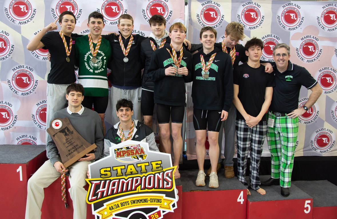 The WJ Boys' Swim and Dive team stand victorious after racking up a total of 313 points, 28 points above the second place Churchill bulldogs. The Girls' team scored a total a 195 points, just two spots off the podium. (Courtesy Tom Murphy)