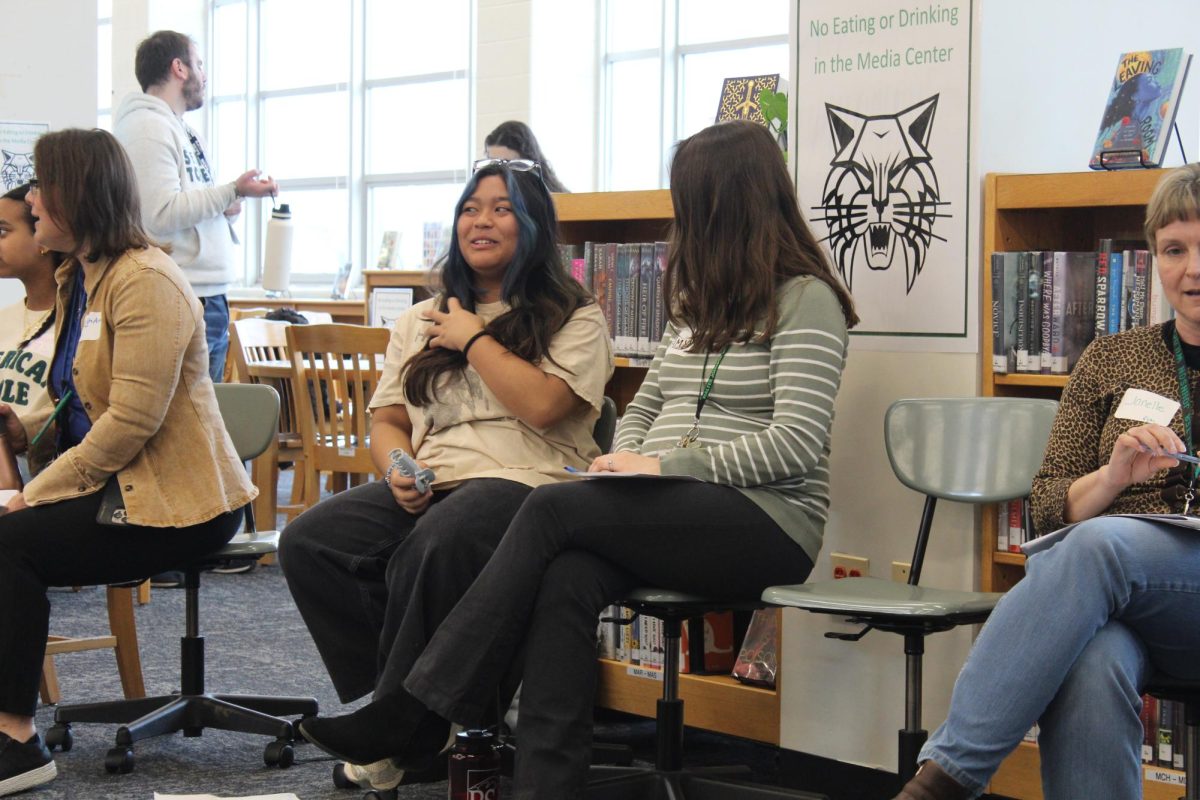 Freshman Aerian Calusa speaks with a staff member about someone who inspires her. Throughout study circles, conversation with someone with a different perspective is valued as a practice to open up discussions with different viewpoints.