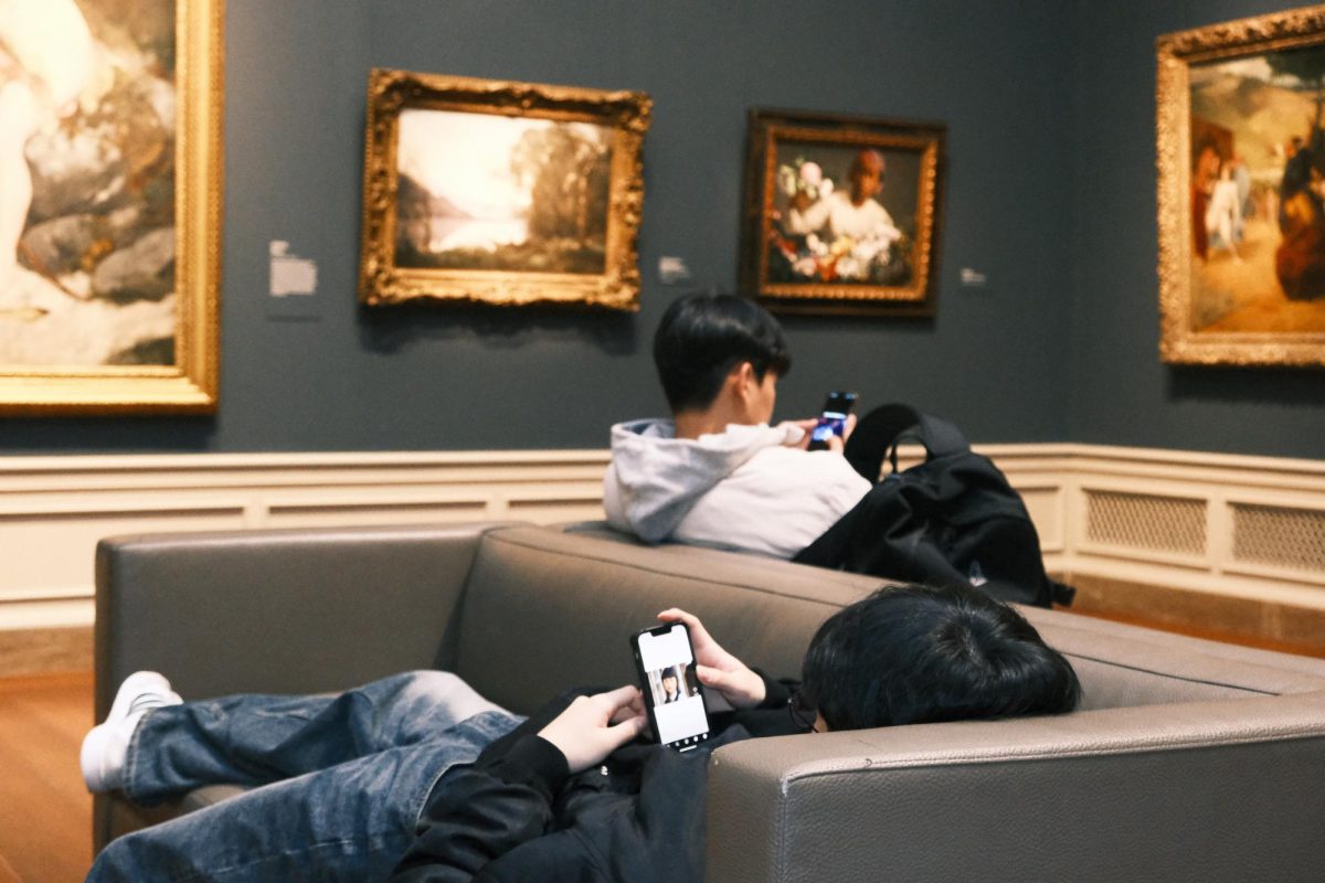 Two students share similar interests for art on the field trip to The National Gallery of Art, yet their attention to their phones will keep them from ever finding out.  