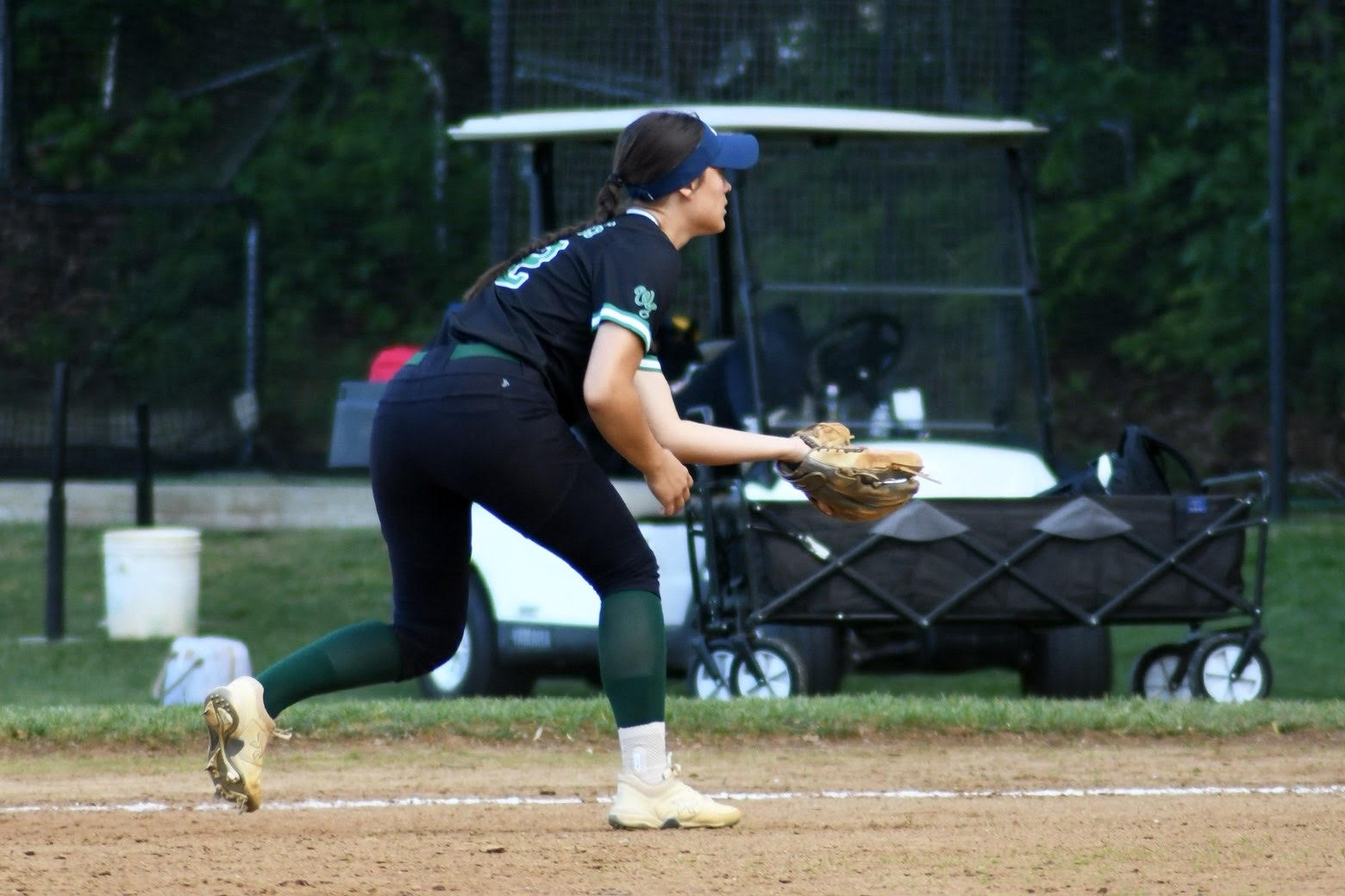Senior captain Ella Reynolds fields a groundball hit by third base. Her performance at that position is vital to the Wildcat infield. (Courtesy WJ Softball)