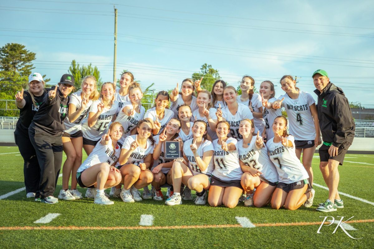 The CatLaxKillas celebrate after defeating B-CC 10-3 on May 11 to capture the region championship.